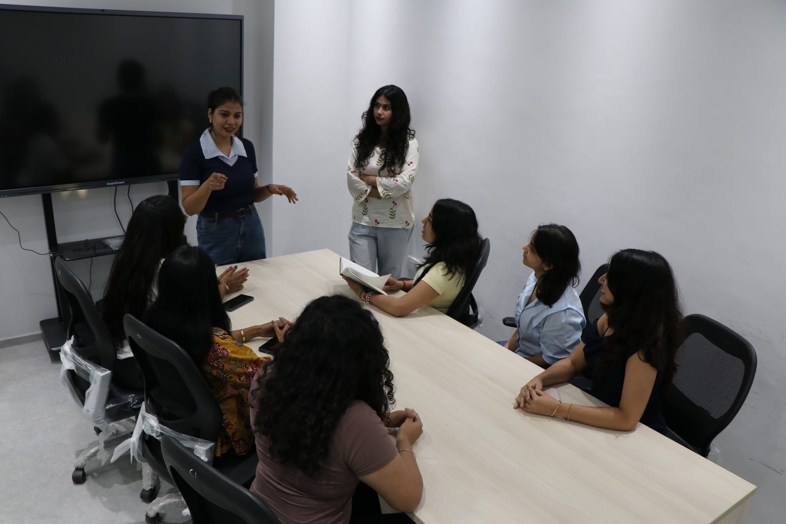 EGN India team in a meeting at the Noida office